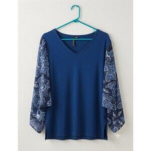 New Directions top features a solid navy blue body contrasted with paisley PM